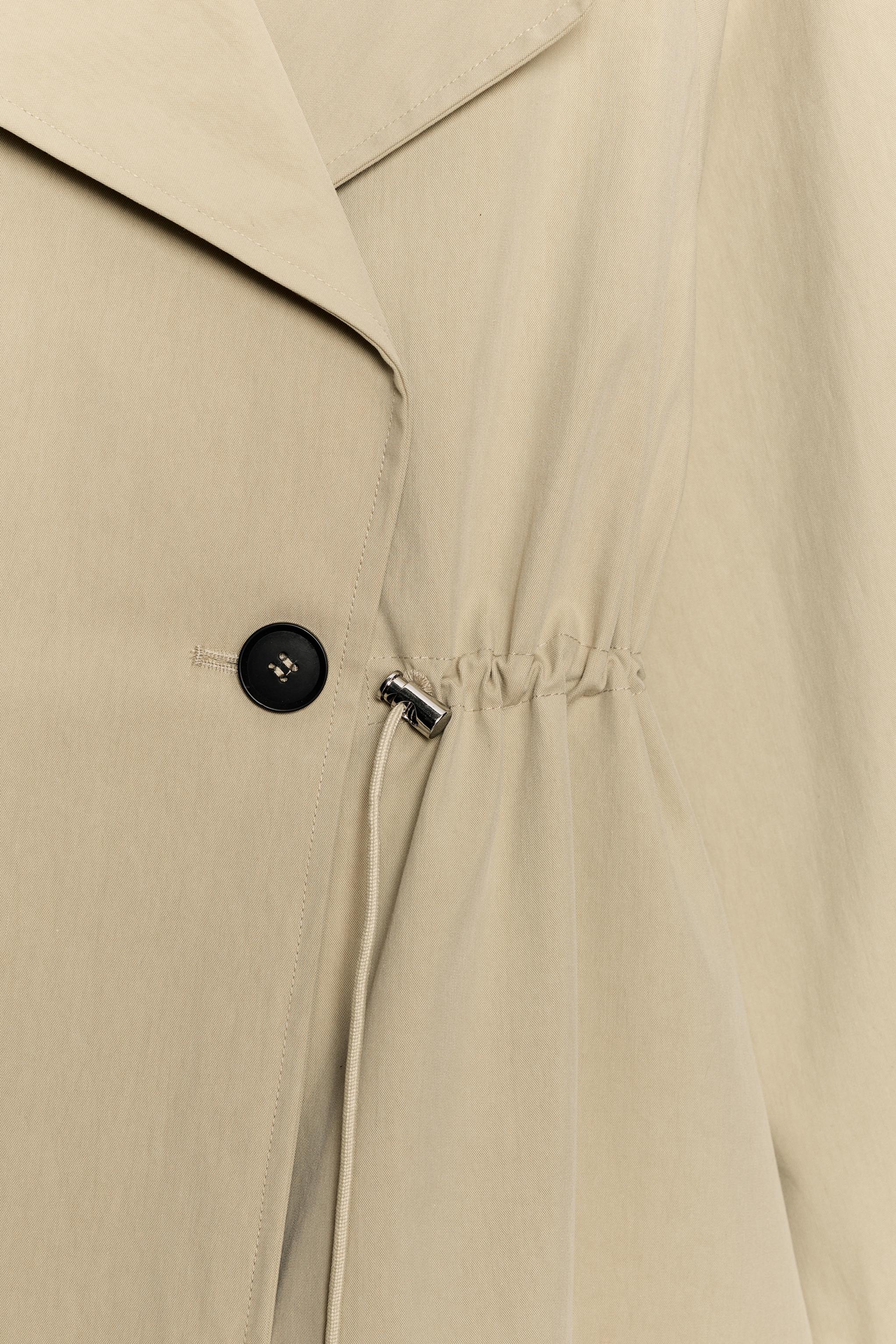 DOUBLE-BREASTED DRAWSTRING TRENCH JACKET